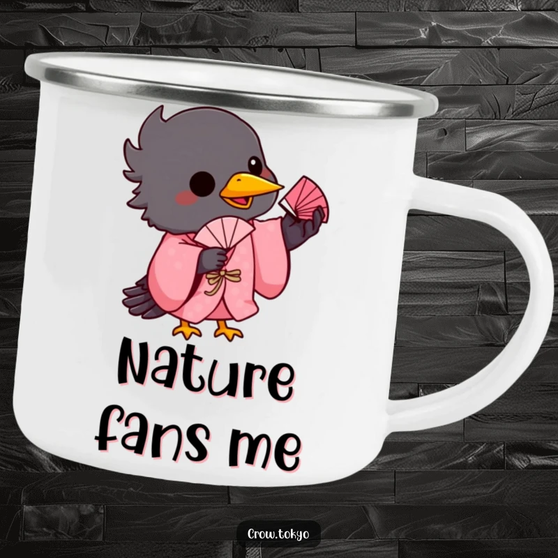 Funny camping mug showing a playful crow in a pink kimono, balancing a small fan on its beak.